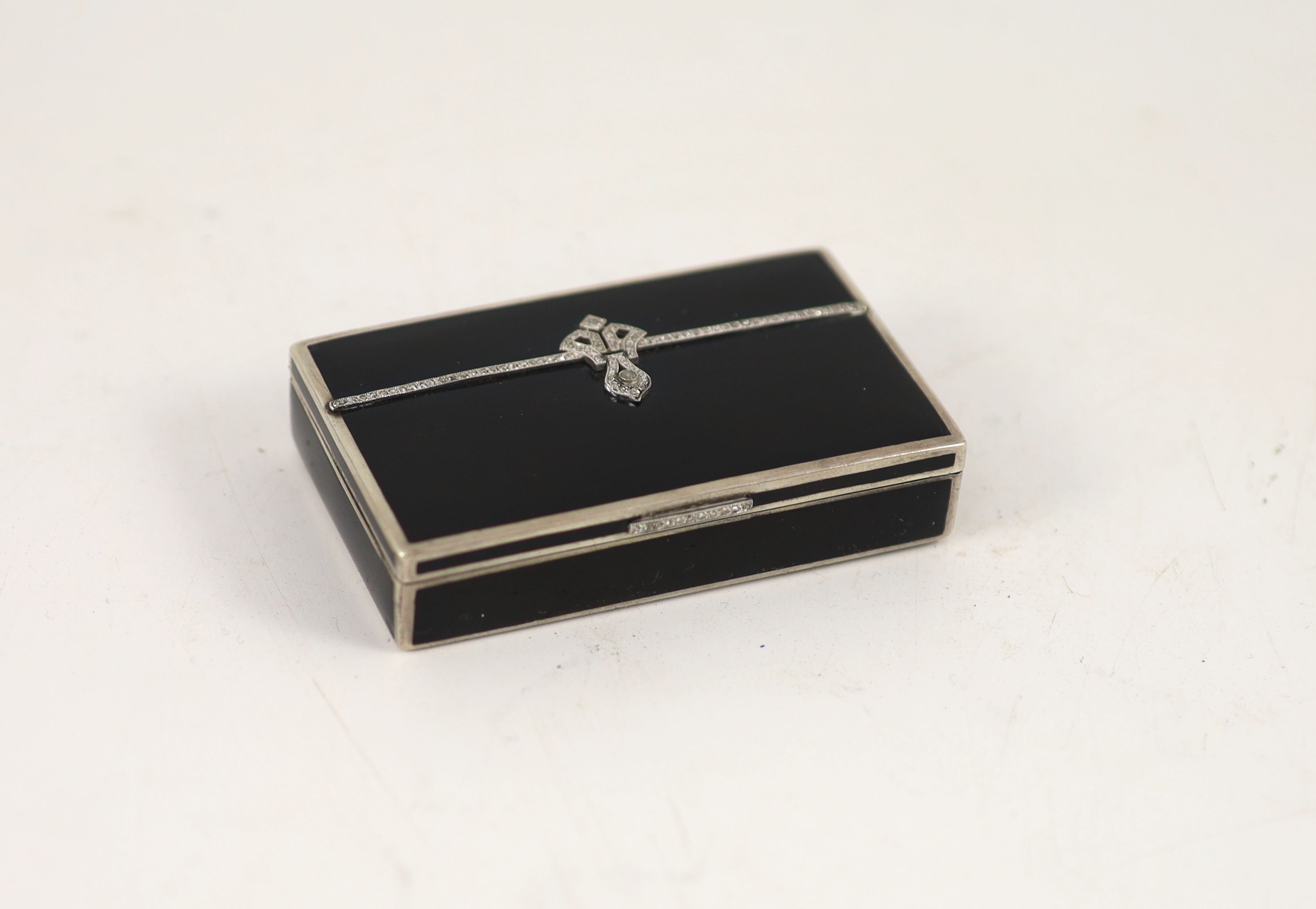 A 1930's silver, black enamel and rose cut diamond set rectangular snuff box, by S.J. Rose & Son